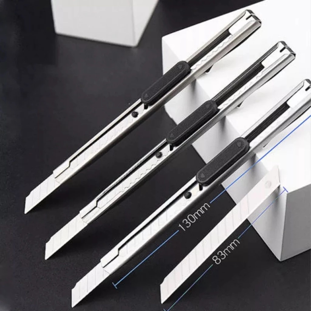 Ảnh nhỏ của Dao rọc giấy lưỡi nhỏ cắt giấy văn phòng vỏ kim loại siêu bén Dao rọc giấy lưỡi nhỏ cắt giấy văn phòng vỏ kim loại siêu bén